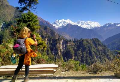 Tourist taking a picture of Mt. Manaslu while on the manaslu circuit trek